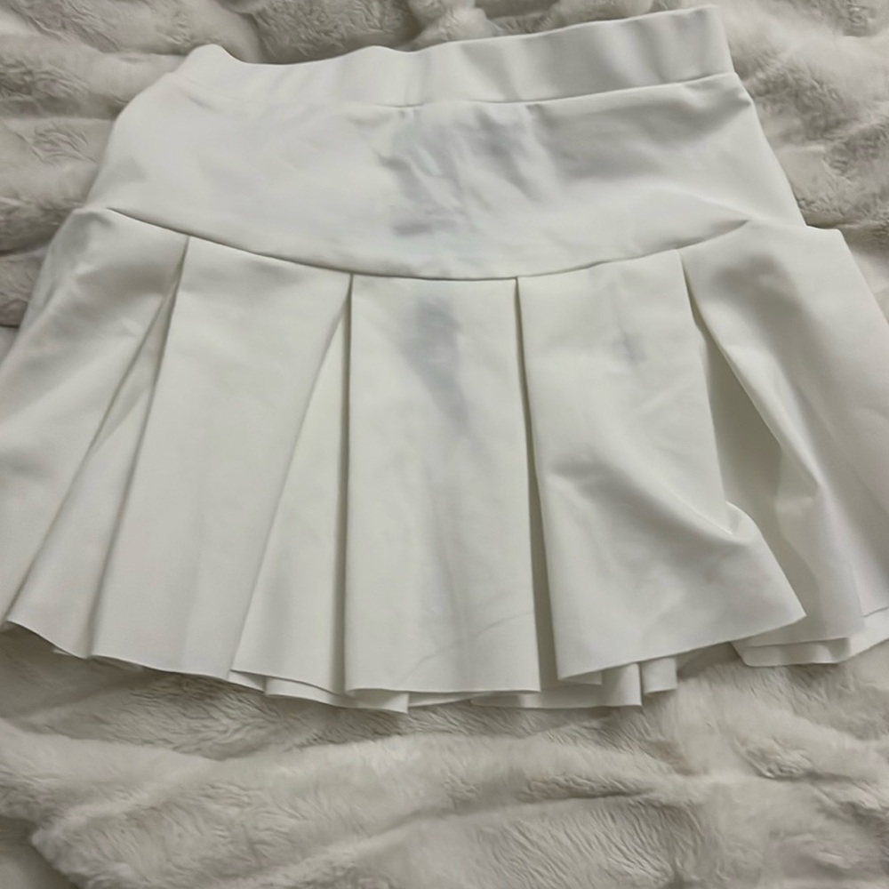 white pleated skirt